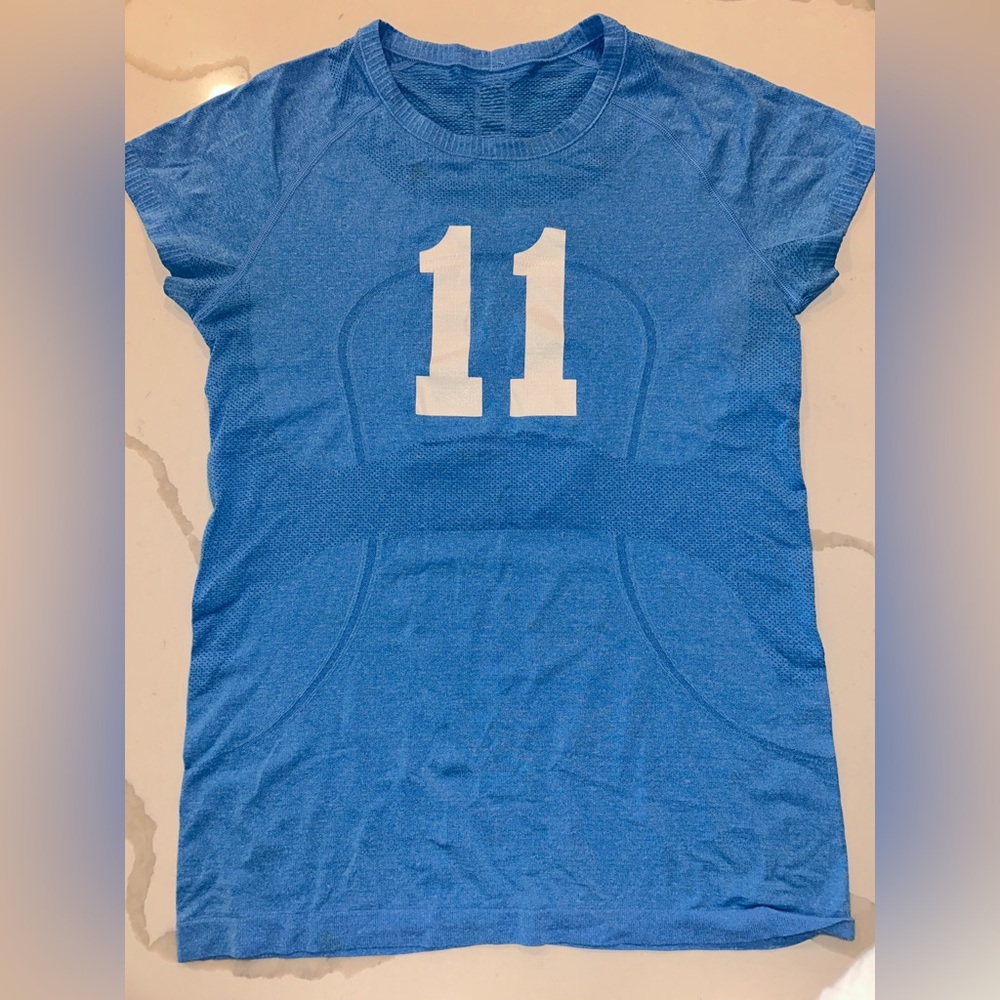 cute swiftly tech short sleeve lulu lemon size 8! Great condition!